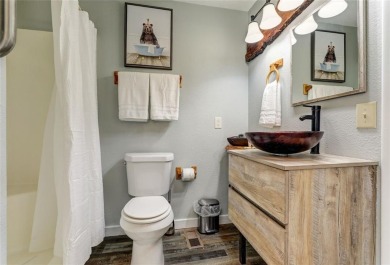 This spectacular villa offers seasonal views of Lake Petit and on Big Canoe Golf Club - Cherokee in Georgia - for sale on GolfHomes.com, golf home, golf lot