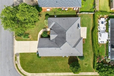 This thoughtfully designed 4-bedroom, 3-bathroom all-brick home on Moores Mill Golf Club in Alabama - for sale on GolfHomes.com, golf home, golf lot