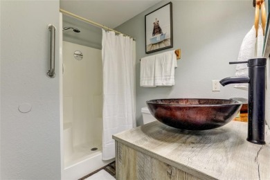 This spectacular villa offers seasonal views of Lake Petit and on Big Canoe Golf Club - Cherokee in Georgia - for sale on GolfHomes.com, golf home, golf lot