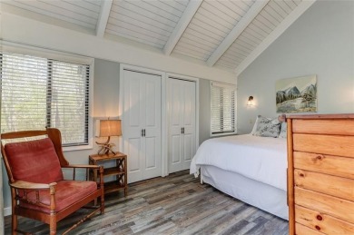 This spectacular villa offers seasonal views of Lake Petit and on Big Canoe Golf Club - Cherokee in Georgia - for sale on GolfHomes.com, golf home, golf lot