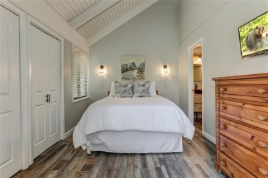 This spectacular villa offers seasonal views of Lake Petit and on Big Canoe Golf Club - Cherokee in Georgia - for sale on GolfHomes.com, golf home, golf lot
