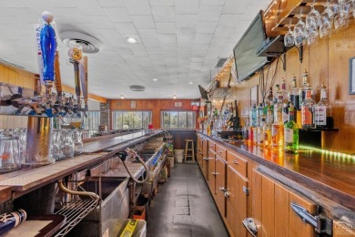 Own a piece of history with this unique mid-century modern on Winding Brook Country Club in New York - for sale on GolfHomes.com, golf home, golf lot