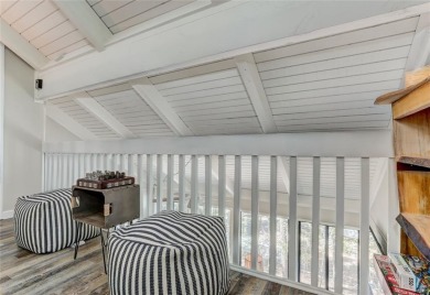 This spectacular villa offers seasonal views of Lake Petit and on Big Canoe Golf Club - Cherokee in Georgia - for sale on GolfHomes.com, golf home, golf lot