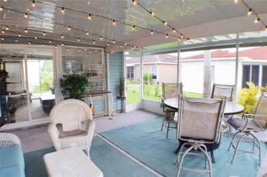 Welcome to this charming 2-bedroom, 2-bath home in the popular on Tampa Bay Golf and Country Club in Florida - for sale on GolfHomes.com, golf home, golf lot