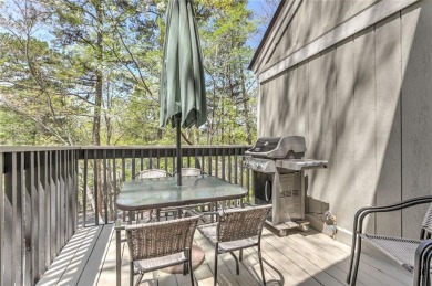 This spectacular villa offers seasonal views of Lake Petit and on Big Canoe Golf Club - Cherokee in Georgia - for sale on GolfHomes.com, golf home, golf lot