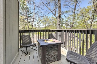This spectacular villa offers seasonal views of Lake Petit and on Big Canoe Golf Club - Cherokee in Georgia - for sale on GolfHomes.com, golf home, golf lot