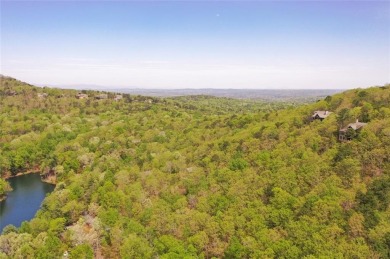 This spectacular villa offers seasonal views of Lake Petit and on Big Canoe Golf Club - Cherokee in Georgia - for sale on GolfHomes.com, golf home, golf lot