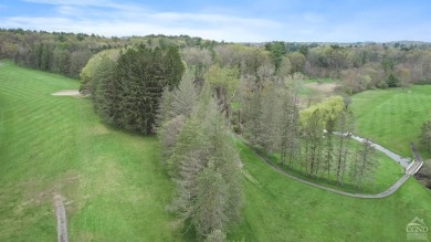 Own a piece of history with this unique mid-century modern on Winding Brook Country Club in New York - for sale on GolfHomes.com, golf home, golf lot