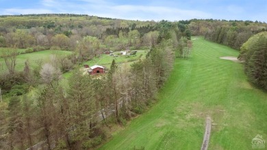 Own a piece of history with this unique mid-century modern on Winding Brook Country Club in New York - for sale on GolfHomes.com, golf home, golf lot