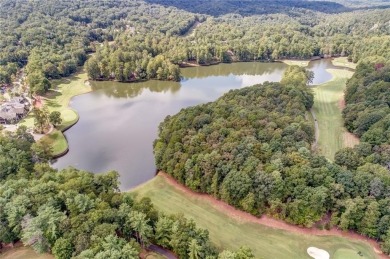 This spectacular villa offers seasonal views of Lake Petit and on Big Canoe Golf Club - Cherokee in Georgia - for sale on GolfHomes.com, golf home, golf lot