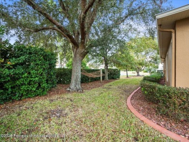 This Glen Lakes Estate Home features a BRAND-NEW ROOF completed on Glen Lakes Country Club in Florida - for sale on GolfHomes.com, golf home, golf lot