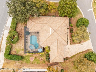 This Glen Lakes Estate Home features a BRAND-NEW ROOF completed on Glen Lakes Country Club in Florida - for sale on GolfHomes.com, golf home, golf lot