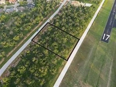 Lot 4011 Experience luxury living at The Landings Airpark near on Pecan Plantation Country Club in Texas - for sale on GolfHomes.com, golf home, golf lot