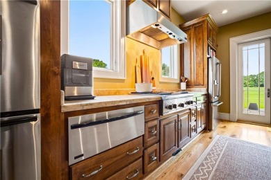 Custom built home with sweeping views of the 18th tee and the on Heron Lakes Country Club in Alabama - for sale on GolfHomes.com, golf home, golf lot