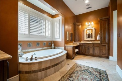 Custom built home with sweeping views of the 18th tee and the on Heron Lakes Country Club in Alabama - for sale on GolfHomes.com, golf home, golf lot