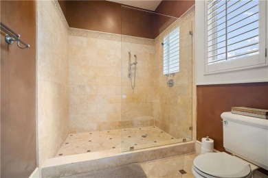Custom built home with sweeping views of the 18th tee and the on Heron Lakes Country Club in Alabama - for sale on GolfHomes.com, golf home, golf lot