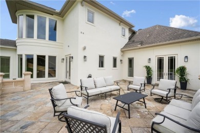 Custom built home with sweeping views of the 18th tee and the on Heron Lakes Country Club in Alabama - for sale on GolfHomes.com, golf home, golf lot