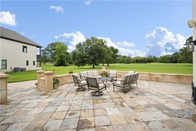 Custom built home with sweeping views of the 18th tee and the on Heron Lakes Country Club in Alabama - for sale on GolfHomes.com, golf home, golf lot