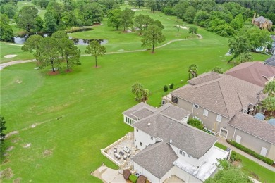 Custom built home with sweeping views of the 18th tee and the on Heron Lakes Country Club in Alabama - for sale on GolfHomes.com, golf home, golf lot