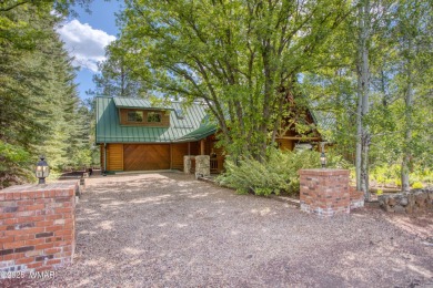 Nestled in the serene beauty of Pinetop Country Club, this on Pinetop Lakes Country Club in Arizona - for sale on GolfHomes.com, golf home, golf lot