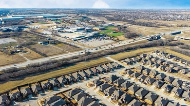 Welcome to this beautifully maintained DR Horton home built in on The Golf Club At Champions Circle in Texas - for sale on GolfHomes.com, golf home, golf lot