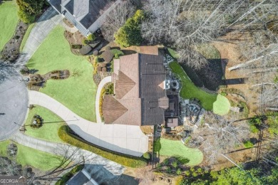 This Exceptional Home in the Prestigious Woodmont Golf & Country on Woodmont Golf and Country Club in Georgia - for sale on GolfHomes.com, golf home, golf lot