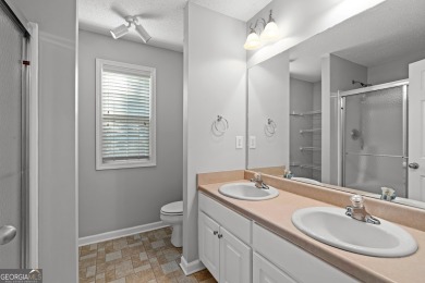 Tucked into the desirable Summergrove community, this inviting on Summergrove Golf Club in Georgia - for sale on GolfHomes.com, golf home, golf lot