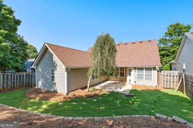 Tucked into the desirable Summergrove community, this inviting on Summergrove Golf Club in Georgia - for sale on GolfHomes.com, golf home, golf lot
