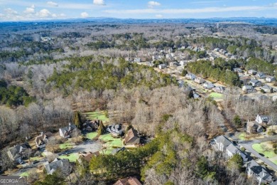 This Exceptional Home in the Prestigious Woodmont Golf & Country on Woodmont Golf and Country Club in Georgia - for sale on GolfHomes.com, golf home, golf lot