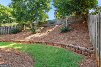 Tucked into the desirable Summergrove community, this inviting on Summergrove Golf Club in Georgia - for sale on GolfHomes.com, golf home, golf lot