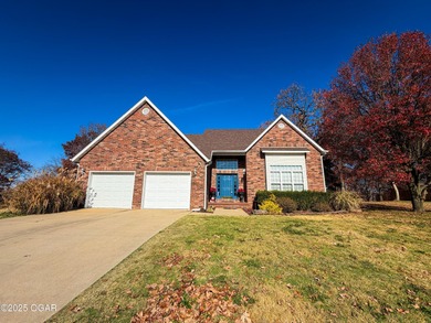 Welcome to this beautifully maintained 1.5-story home with a on Briarbrook Golf Course in Missouri - for sale on GolfHomes.com, golf home, golf lot