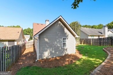 Tucked into the desirable Summergrove community, this inviting on Summergrove Golf Club in Georgia - for sale on GolfHomes.com, golf home, golf lot