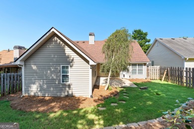 Tucked into the desirable Summergrove community, this inviting on Summergrove Golf Club in Georgia - for sale on GolfHomes.com, golf home, golf lot