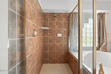 This home has so much potential and is just waiting for your on Plantation Bay Golf and Country Club in Florida - for sale on GolfHomes.com, golf home, golf lot