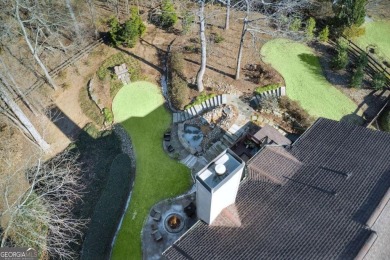 This Exceptional Home in the Prestigious Woodmont Golf & Country on Woodmont Golf and Country Club in Georgia - for sale on GolfHomes.com, golf home, golf lot