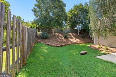 Located in the highly sought-after Summergrove neighborhood in on Summergrove Golf Club in Georgia - for sale on GolfHomes.com, golf home, golf lot