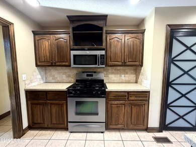 Welcome to this beautifully maintained 1.5-story home with a on Briarbrook Golf Course in Missouri - for sale on GolfHomes.com, golf home, golf lot