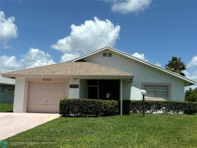 Free standing single family Waterfront home in the gated on Cypress Lakes Golf Course - West Palm Beach in Florida - for sale on GolfHomes.com, golf home, golf lot