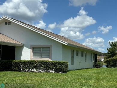 Free standing single family Waterfront home in the gated on Cypress Lakes Golf Course - West Palm Beach in Florida - for sale on GolfHomes.com, golf home, golf lot