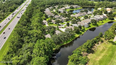 This home has so much potential and is just waiting for your on Plantation Bay Golf and Country Club in Florida - for sale on GolfHomes.com, golf home, golf lot