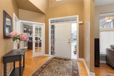 OPEN, SUNDAY 12/7 (1-3PM).  Beautiful home located in the on Oakhurst Golf and Country Club in Michigan - for sale on GolfHomes.com, golf home, golf lot