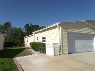 Here is a spacious, 2005 beautiful Home with a double car garage on Schalamar Creek Golf and Country Club in Florida - for sale on GolfHomes.com, golf home, golf lot