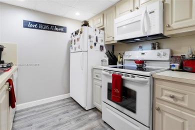 WELCOME TO YOUR BEAUTIFUL CONDO IN CENTURY VILLAGE PINES ACTIVE on Flamingo Lakes Country Club in Florida - for sale on GolfHomes.com, golf home, golf lot