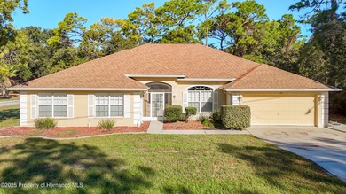 Welcome to this beautifully updated 4-bedroom, 3-bath home on Southern Woods Golf Club in Florida - for sale on GolfHomes.com, golf home, golf lot