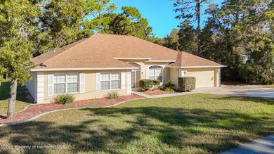 Welcome to this beautifully updated 4-bedroom, 3-bath home on Southern Woods Golf Club in Florida - for sale on GolfHomes.com, golf home, golf lot
