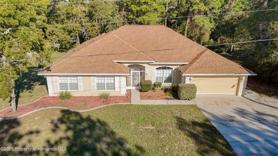 Welcome to this beautifully updated 4-bedroom, 3-bath home on Southern Woods Golf Club in Florida - for sale on GolfHomes.com, golf home, golf lot