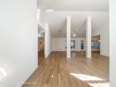 Welcome to this beautifully updated 4-bedroom, 3-bath home on Southern Woods Golf Club in Florida - for sale on GolfHomes.com, golf home, golf lot