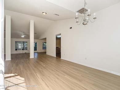 Welcome to this beautifully updated 4-bedroom, 3-bath home on Southern Woods Golf Club in Florida - for sale on GolfHomes.com, golf home, golf lot