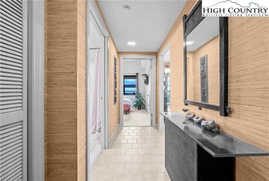 High atop Sugar Mountain, this 2-bedroom, 2-bath condo at on Sugar Mountain Golf Course in North Carolina - for sale on GolfHomes.com, golf home, golf lot
