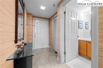 High atop Sugar Mountain, this 2-bedroom, 2-bath condo at on Sugar Mountain Golf Course in North Carolina - for sale on GolfHomes.com, golf home, golf lot